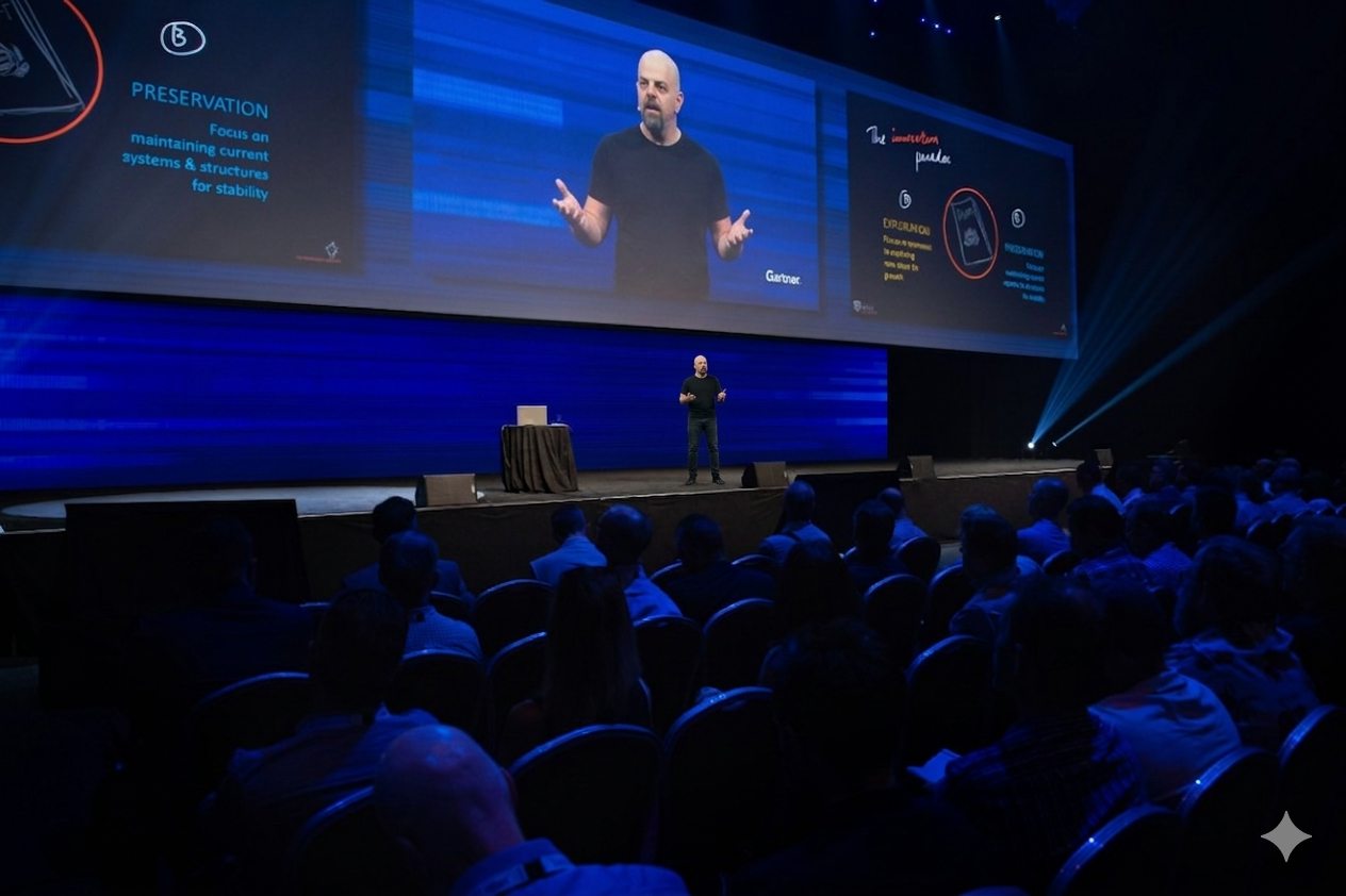Bart A. Basi III speaking on a conference keynote stage